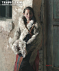油画—靠墙站着的藏族女孩