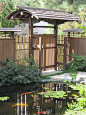 japanese koi ponds | beautiful Japanese Roofed Entry Gate next to a Koi Pond