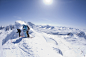 Three skiers look down an exposed ridge in Valdez, Alaska. by Adventure Joe on 500px