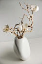 Ceramic Akasha Rock vase with preserved orchids... This arr would look good anywhere ~ minimal and elegant design