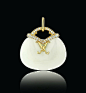 NEPHRITE PURSE PENDANT  18K yellow gold nephrite pendant. Set with 24 round brilliant cut diamonds for a total weight of 0.08 ct.