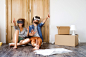 Young couple with VR glasses moving in new house. by Jozef Polc on 500px