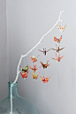 There is a legend that someone who makes a thousand origami cranes, their wish will be granted. Here are instructions for making a paper crane: http://www.origami-instructions.com/origami-crane.html