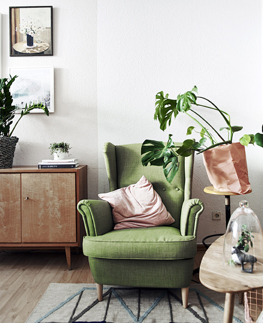 A green armchair nex...