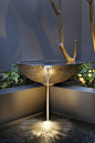A contemporary water feature showing what a difference good lighting can make. This one by The Garden Light Company.: 