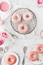 baked doughnuts with pink almond glaze: 