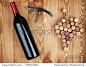 Red wine bottle, corkscrew and grape shaped corks on wooden table background 正版图片|正版微利素材库 - 海洛创意（HelloRF） - 站酷旗下产品 - Shutterstock中国独家合作伙伴
