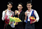 Yuzuru Hanyu of Japan with his silver medal Daisuke Takahashi of Japan with his gold medal and Patrick Chan of Canada with his bronze medal after the...