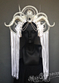 MissGDesignsShop Hand-made Ice Queen headdress. With faux feathers and faux horns. Accented with a spike studded skull and silk flowers. Your custom piece can: 