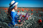 People 1920x1280 women brunette hat women outdoors long hair sunlight flowers looking away dress bouquet field Sergey Shatskov