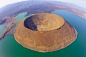 Nabiyotum Crater in Lake Turkana - the world's largest desert lake and the world's largest alkaline lake - in the Great Rift Valley in Kenya
位于肯尼亚东非大裂谷的图尔卡纳湖是世界上最大的沙漠湖泊，也是世界上最大的碱水湖，图为该湖泊中的Nabiyotum火山口。