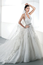 An incredible lace halter wedding gown by Demetrios.