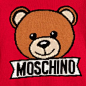 Baby Boys Red Knitted Teddy Sweater : Baby boys red sweater by Moschino Baby, featuring a large teddy bear on the chest with the designer's logo below. Made in a knitted cotton and wool blend, it is ribbed around the v-neckline, cuffs and hem. It fastens 