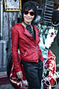 Joan Jett -Wearing a red leather jacket