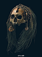以猎头和食人闻名的部落，阿斯马特族的头骨装饰。