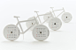 Bike | Calendar | Beitragsdetails | iF ONLINE EXHIBITION : Bike is a bicycle-shaped paper craft calendar. The set includes a paper frame, wheels, handlebar, and kickstand, as well as brass screws. Two months are shown at once, on the front and rear wheels