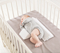 婴儿睡在婴儿床上 Delta Baby Sleep – Side Positioner : Specially designed to keep infants comfortably and securely positioned on their side. Baby Sleep is the ideal accessory for preventing babies from rolling over...更多高品质优质采集-->>@大洋视觉

