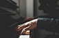 A grainy shot of a pianist's hands on the keyboard