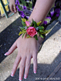 Wrist corsage  Pink spray rose, yellow solidaster and rosemary. Flowers and photo by The Wild Orchid floral design in Sebastopol.