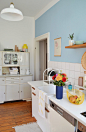 gray hutch in blue-and-white kitchen