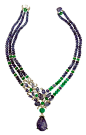 L'Odyssée de Cartier high jewellery necklace in platinum, set with a 67.94ct carved sapphire, melon-cut sapphire, emerald beads, sapphire carved leaves and diamonds.