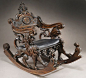 Columbian Exposition carved walnut Fantasy Rocker from "World's Columbian Exhibition 1492. Chicago. 1892.",  The back carved to read, "ANTI BROTHERS VICENZA ITALY". Circa - 1892.