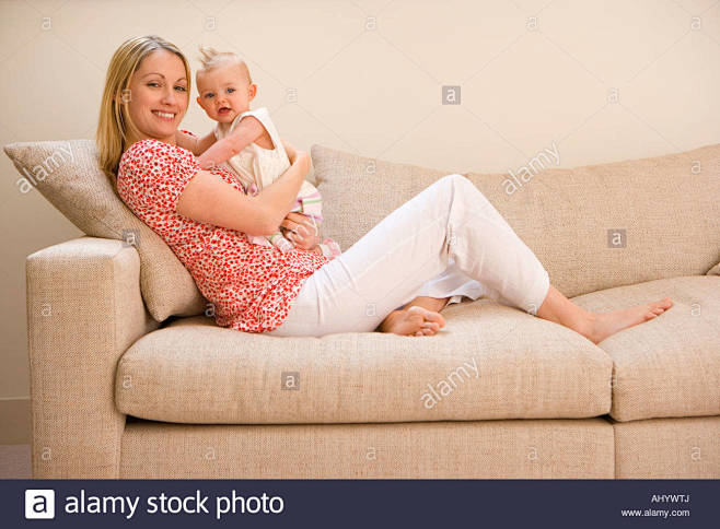 mother-holding-baby-...