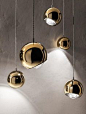 This spherical suspension design is reminiscent of an eye which can look in any corner of the room. It is a precise light paired with an elegant design. Its metallic spherical body has a round and convex lens located on one side. Its angle is adjustable a