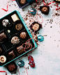 Box of gourmet chocolates on a Christmas themed tablescape
