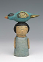 ceramic figure with bird by Sara Swink: 