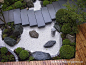 Japanese garden Nice small tsubo-niwa.  Also, VERY intersting arrangement of the 3 rocks in the center.  More equivalently spaced than normal, and unless you're supposed to look at it from the bottom L, also an unusual structure - 3 rocks with 1 tall &