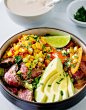 Cheddar Rice Bowls with Marinated Flank Steak, Corn, & Chipotle Drizzle | yestoyolks.com