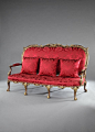 The George II settee from Grimsthorpe Castle (carved mahogany and parcel gilt in red damask) – c.1751.