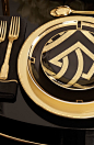 A black and gold art deco tablesetting from Ralph Lauren Home epitomizes opulence.: