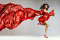 Woman in red waving dress with flying fabric by Jaroslav Monchak on 500px