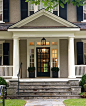 farmhouse front door and lantern light