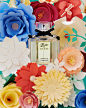 Flora by Gucci | Papercrafted flowers : 2 images we shot featuring the perfume Flora by Gucci surrounded by papercrafted flowers.