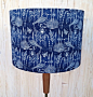 Sashiko Bird Navy Fabric covered lamp shade : Beautiful midnight blue with white etched birds,plants and seeds. The fabric covering this lamp shade is by Cloud9 fabrics .  The lampshades are all handmade by me (Anne) in Paisley Scotland. The size of this 