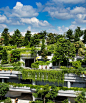 WOHA unites mixed-use singapore development beneath a terraced rooftop park