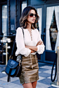 Annabelle Fleur rocks the lace up trend on both her metallic skirt and cute white blouse. Top/Skirt: Rebecca Minkoff.: 