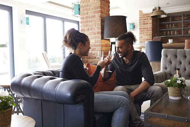 Young Couple Celebra...