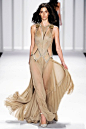 J Mendel..This gown shows just enough. Nude and sheer, without being vulgar or looking like lingerie.