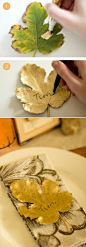 DIY gilded leaf place cards . You can use Martha Stewarts Gold paint in the tub too.  I did these big leaves from a London Plane sycamore tree last year an they are still good.  I used them for the top plate since I did not have anything gold, then put th