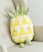 This plush pal has some real personality! The pineapple has an infectious smile and embroidered, bright green legs and stalk that perfectly compliment the yellow triangle pattern all across the front. It makes a great huggable plush for a little extra sec