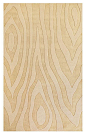 This ivory wool area rug has just enough movement to form an interesting foundation for a room.: 