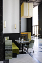 Bright green velvet and dark green marble banquette seating at Monsieur Bleu by Joseph Dirand, Remodelista