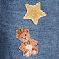 Baby Girls Blue Cotton Denim Jeans with Bear  : Baby girls adorable jeans, made from soft cotton denim by Dolce & Gabbana. In a light blue wash with fading, pockets, belt loops and rivets. They have appliquéd patches, which include a bear, crown and s