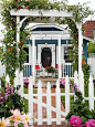 Spruce up an entryway with a flower-covered arbor. More ways to make a better first impression: http://www.bhg.com/home-improvement/exteriors/curb-appeal/make-a-better-first-impression/?socsrc=bhgpin051513floralarbor=2: 