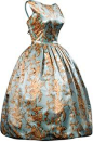 Balenciaga c1957 | Cocktail dress in blue satin, decorated with a golden candelieri print.@北坤人素材