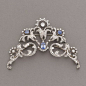 钻石、蓝宝石和白金头饰。本来是三个胸针，大约1920